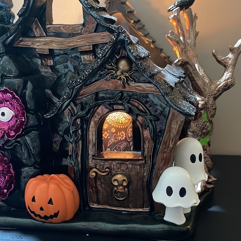 Haunted house luminary candle holder